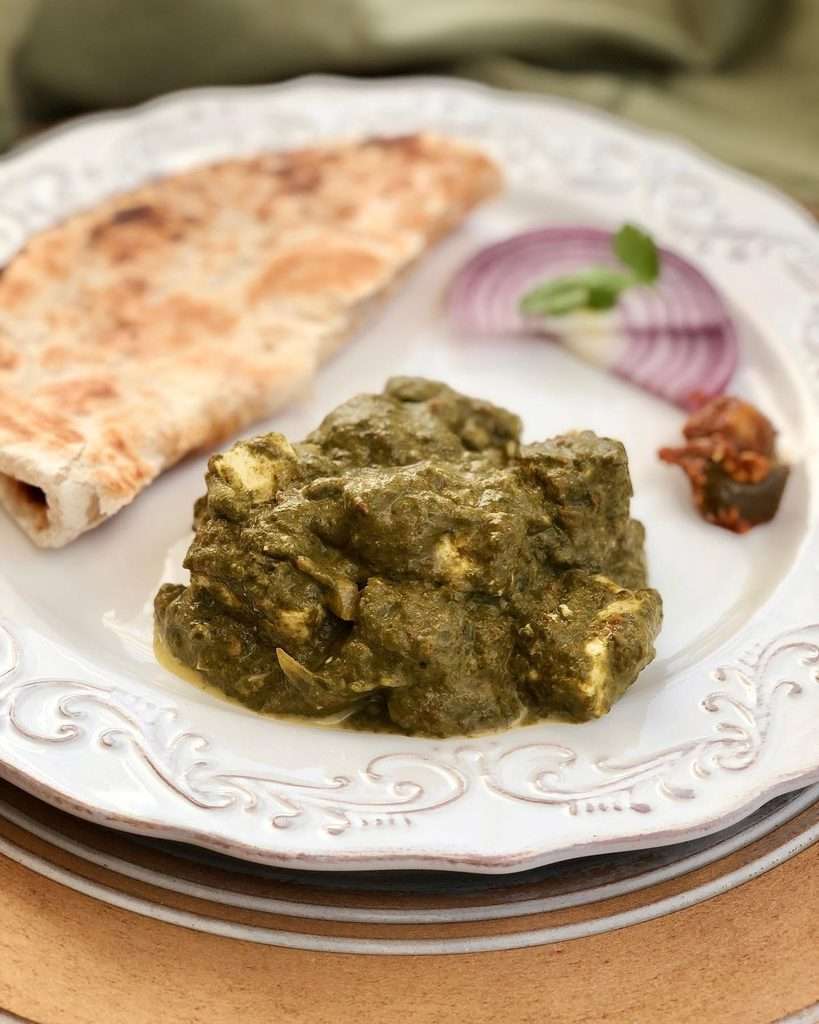 Palak Paneer with Paratha on a plate